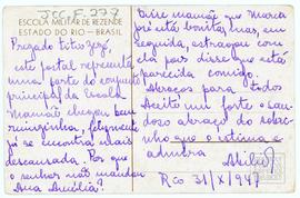 Verso “Prezado titio Zezé, este postal representa uma parte do conjunto principal da Escola. Mamã...